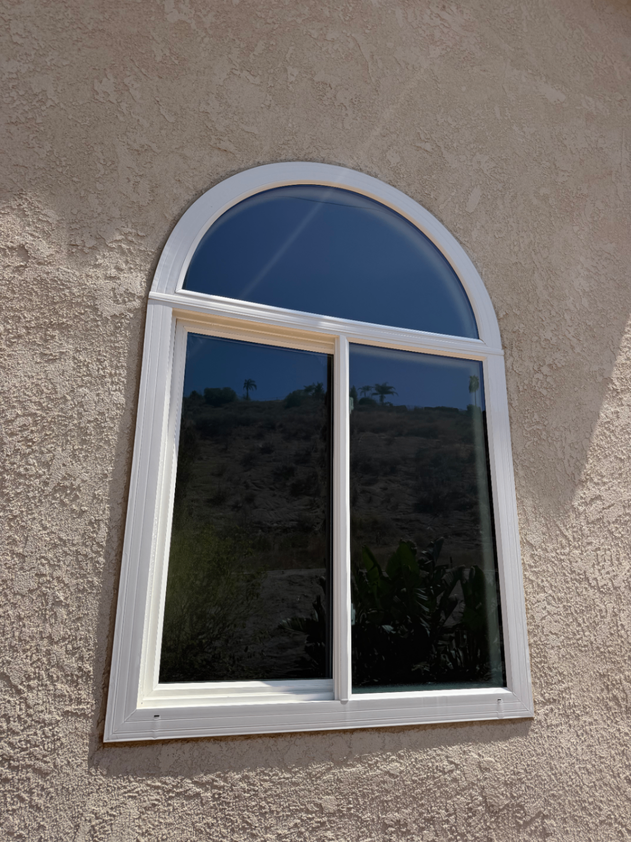 Arched window sparkling after cleaning
