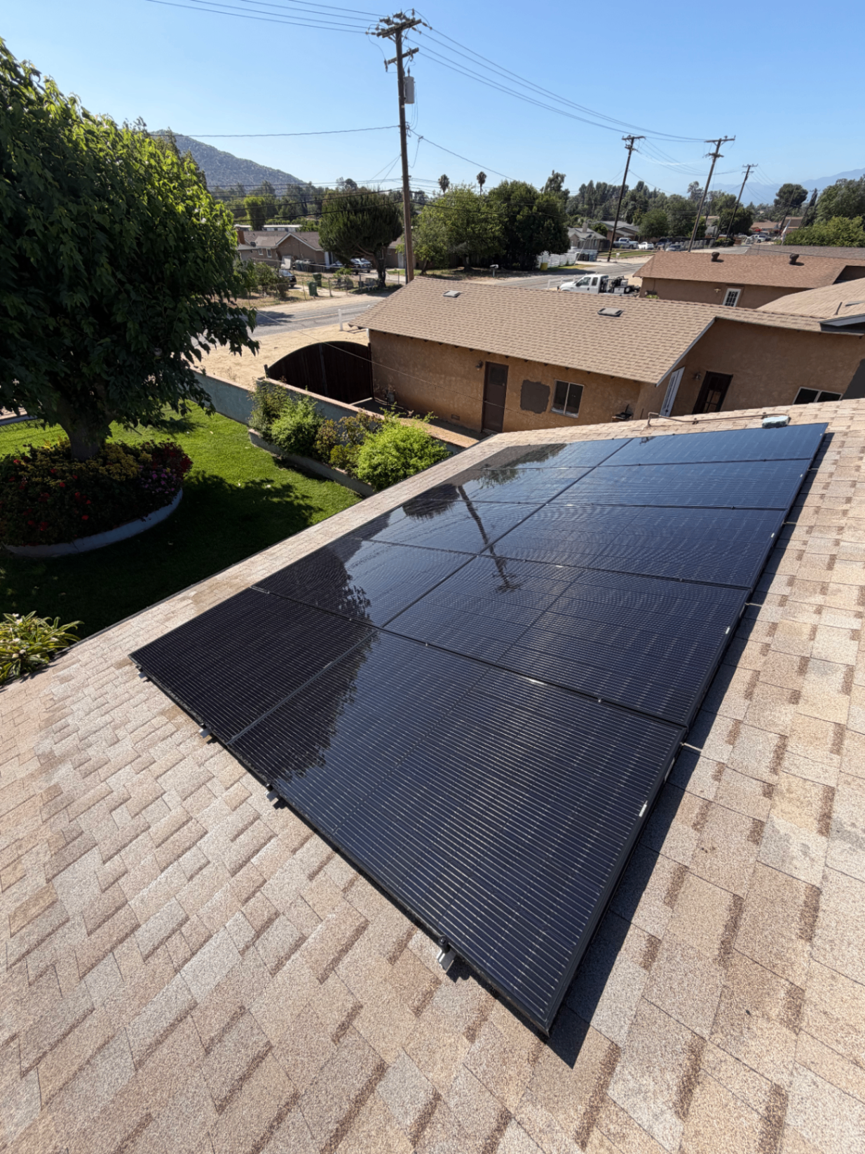 Freshly cleaned solar panels on a residential rooftop